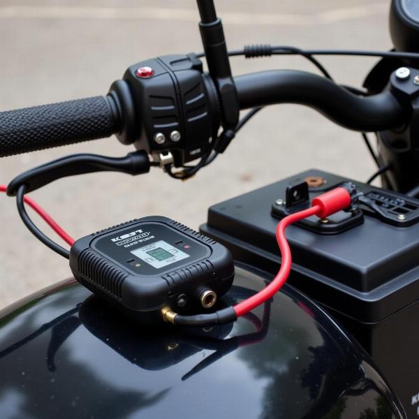 Chargeur permanent batterie moto connecté à une moto