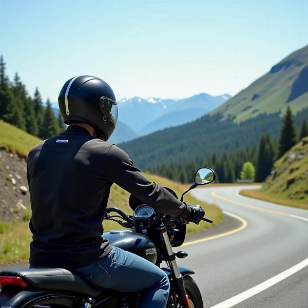 Motard sur une route panoramique utilisant un intercom