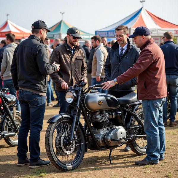 Passionnés de motos anciennes échangeant à la bourse